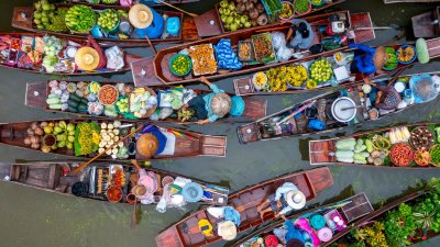 Damnoen Saduak Floating Market, Maeklong Market, and Dragon Temple.  